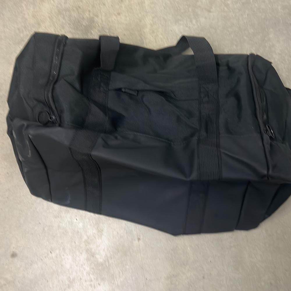 1 million Paco Ribbane black duffel bag
